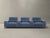 Cannes 4.5 Seater Home Theater Sofa in blue fabric with reclining seats and console units.