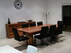 Australian Made Solid Timber Dining Table with black chairs in modern dining room.