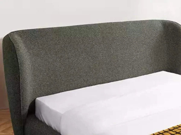 Miller Bed Frame with curved upholstered headboard in a modern bedroom setting.