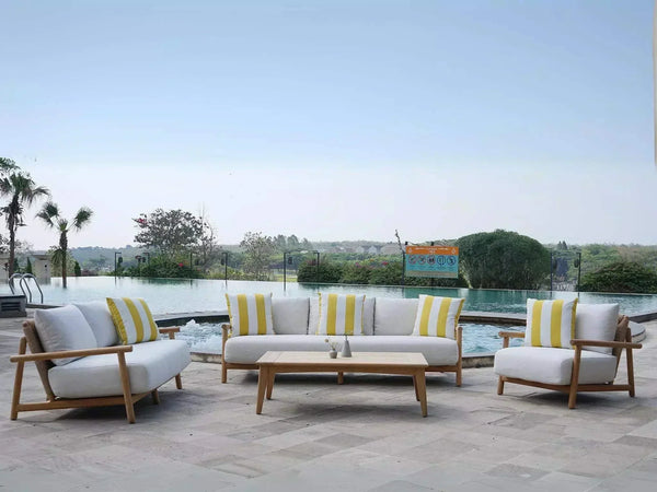 Bahama Outdoor Lounge Set by poolside with teak frame and Sunbrella cushions.