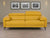 Devereux modern reclining sofa with adjustable headrests and slim metal legs in contemporary living room