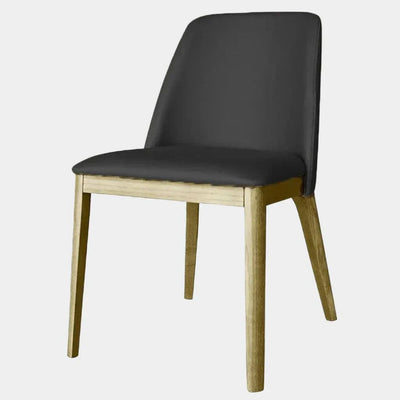 Kai Leather Dining Chair with black leather upholstery and solid timber frame.
