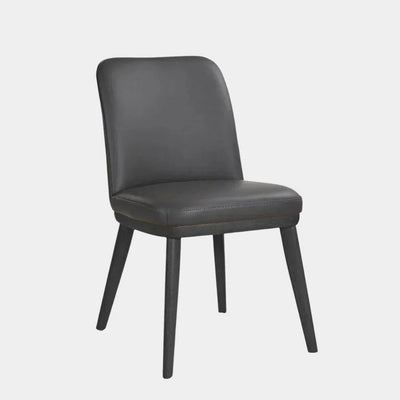 Kent Leather Dining Chair with black leather upholstery and timber legs.