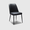 Mitchell Leather Dining Chair in black leather with sleek matt black legs and high backrest for ergonomic support.