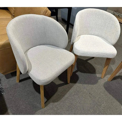 Oliva Fabric Dining Chair with solid timber legs and fluffy Chalk fabric.