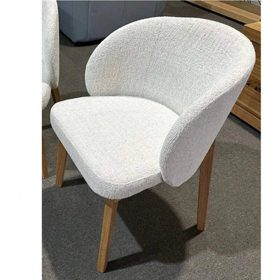 Oliva Fabric Dining Chair with solid timber legs and fluffy Chalk fabric.