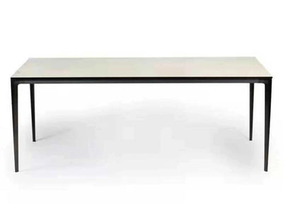 Turin Ceramic Dining Table with black powder-coated steel frame and ceramic top.