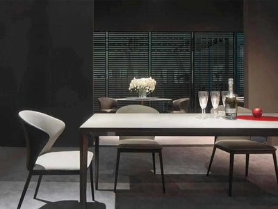 Turin Ceramic Dining Table with black powder-coated steel base, featuring elegant design and marble-like ceramic top.