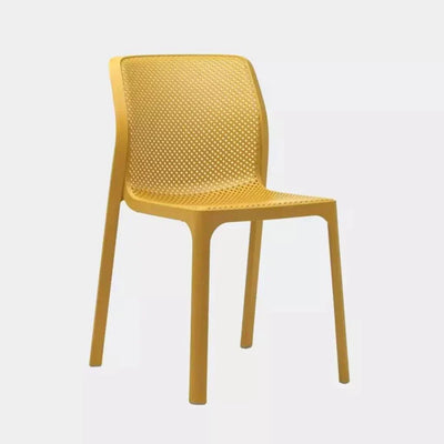 Aldo Outdoor Side Chair with yellow perforated design, modern silhouette, and non-slip feet.