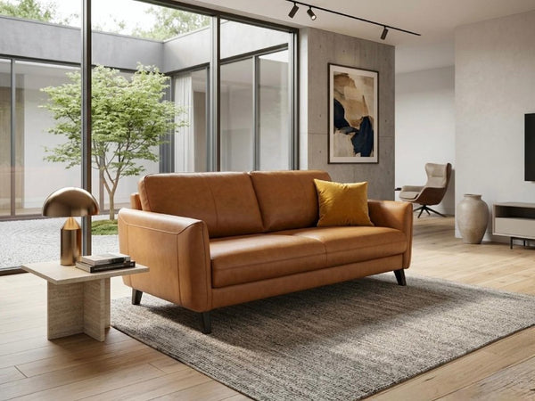Alfred Sofa Bed in modern design, upholstered in fabric, shown as sofa in stylish living room