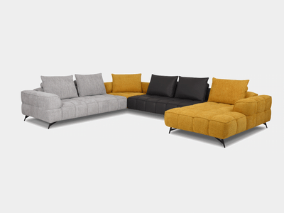 Apollo 6.25 Corner Sofa with Chaise in multi-color upholstery, featuring quilted detailing and sleek metal legs.
