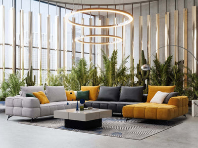Apollo 6.25 Corner Sofa with Chaise in modern living room setting, featuring plush cushions and elegant quilted upholstery.