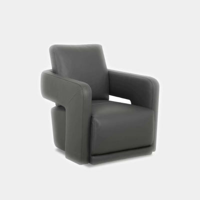 Aria Leather Armchair in premium top grain leather, featuring contemporary design with sculptural silhouette and sleek armrests.