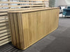 Ashford Buffet with curved edges and fluted detailing in a contemporary setting.
