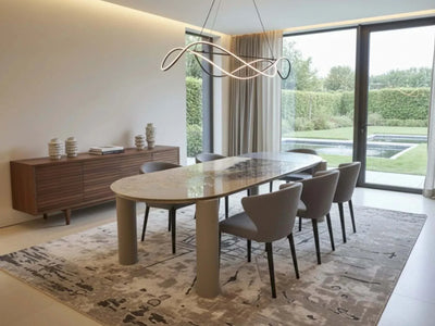 Atlante Italian Lava Stone Dining Table with hand-painted basalt top and powder-coated metal frame in modern dining room