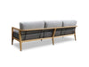 Tribu Outdoor Lounge 3-seater outdoor sofa with teak frame, rope accents, and gray Sunbrella cushions.
