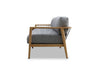 Side view of Tribu Outdoor Lounge 3 Seater Outdoor Sofa with teak frame and grey Sunbrella cushions