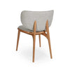 Avery Dining Chair with oatmeal fabric upholstery and natural oak legs, modern curved backrest design.
