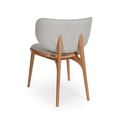 Avery Dining Chair with oatmeal fabric upholstery and natural oak legs, modern curved backrest design.