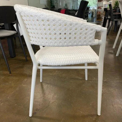 Barcelona Outdoor Dining Chair in white with aluminum frame and German Rehau weave, displayed in an indoor setting.