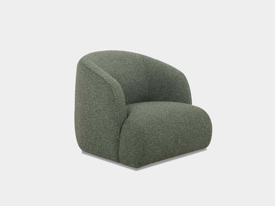 Bon Armchair in green fabric with modern design.