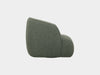 Bon Armchair in green fabric, contemporary design, side view.