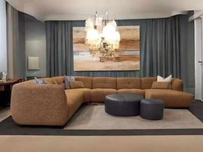 Bric 7.5 Seater Corner Sofa with Chaise in elegant living room setting, featuring plush upholstery and modern design accents.