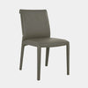Modern fully upholstered leather dining chair in iron leather with padded seat and sleek design
