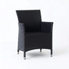 Caribbean Outdoor Dining Chair with handwoven synthetic rattan and powder-coated aluminum frame on patio
