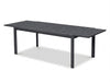 Cebu Outdoor Ceramic Extendable Dining Table with aluminum base and ceramic top in outdoor setting