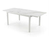 Outdoor ceramic extendable dining table with aluminium base set in garden