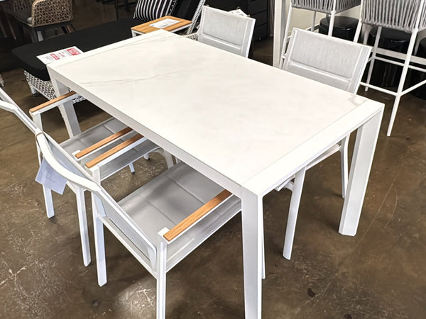 Modern Cebu outdoor ceramic dining table with aluminum base and large ceramic top in charcoal color