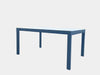 Outdoor ceramic extendable dining table with charcoal aluminum frame and white ceramic top.