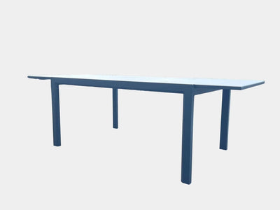 Outdoor ceramic extendable dining table with white ceramic top and sturdy aluminium base.