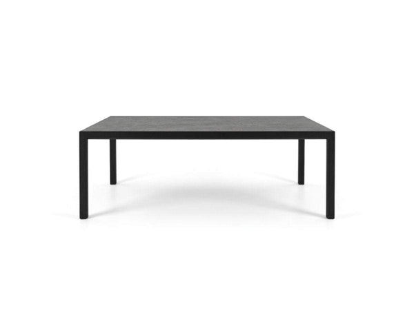 Cebu Outdoor Ceramic Extendable Dining Table - Large with a black aluminium frame and dark ceramic top, sleek modern design.