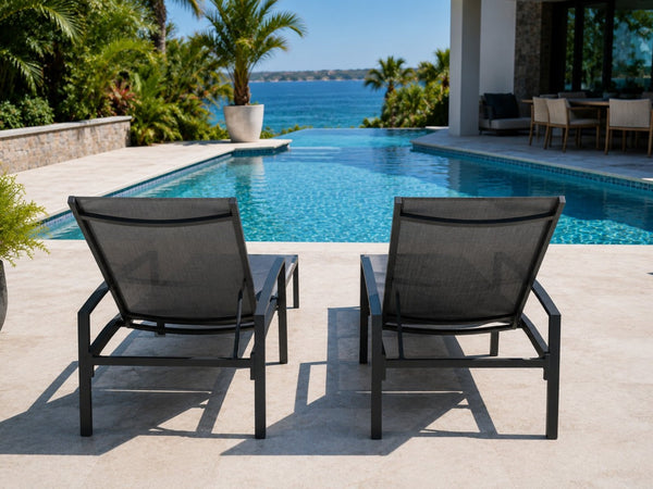 Cebu Sun Lounger outdoor poolside chaise lounge with charcoal powder-coated aluminium frame and French Batyline fabric, featuring pull-out footrest