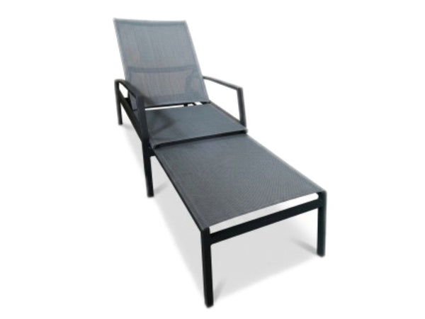 Cebu Sun Lounger with charcoal powder-coated aluminium frame and French Batyline sling fabric featuring pull-out footrest for outdoor poolside relaxation