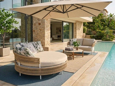 Corsica Daybed outdoor daybed with curved wicker design and Sunbrella cushions