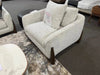 Crosby 1 seater sofa in light fabric with wooden legs on clearance sale displayed in showroom