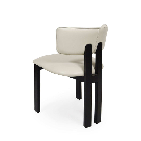 Enzo Dining Chair with black-stained oak frame and frost-coloured leather upholstery showing modern, elegant design