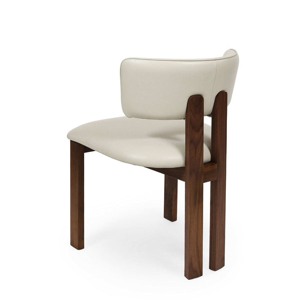 Enzo Dining Chair with black-stained oak frame and frost-colored leather upholstery showcasing modern design and comfort