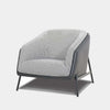 Fashion Leather Armchair with stylish houndstooth pattern and sleek metal legs.