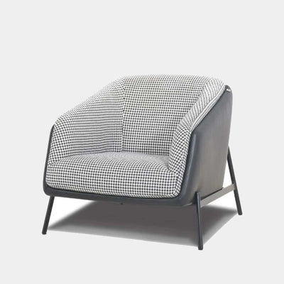 Fashion Leather Armchair with stylish houndstooth pattern and sleek metal legs.