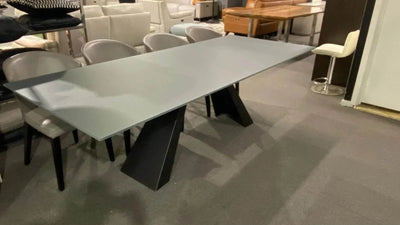 Giove Glass Top Dining Table with black base and grey tempered glass on clearance sale