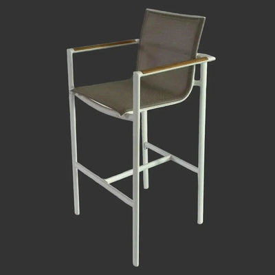 Granada outdoor bar chair with white frame, brown mesh seat, and wooden armrests