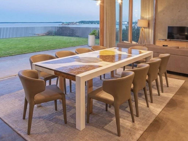 Imperial Outdoor Italian Lava Stone Dining Table handcrafted from basalt with hand-painted lava stone surface and powder-coated metal frame in a garden setting