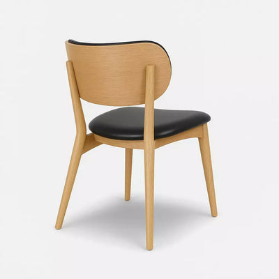 Mid-century modern Jake Leather Dining Chair with natural timber frame and black leather upholstery.