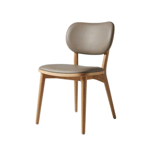 Jake Leather Dining Chair with black leather upholstery and polished rubberwood frame in mid-century modern design