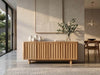 Jordan Buffet Tasmanian Oak sideboard with scalloped carved doors and push-to-open storage compartments