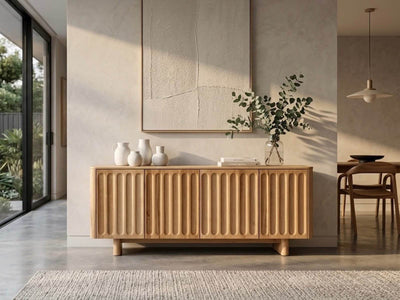 Jordan Buffet Tasmanian Oak sideboard with scalloped carved doors and push-to-open storage compartments